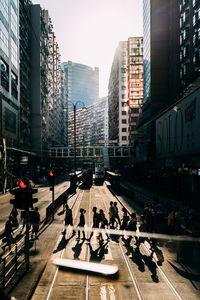 City street and modern buildings against sky