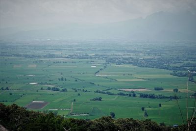 High angle view of agricultural field against sky