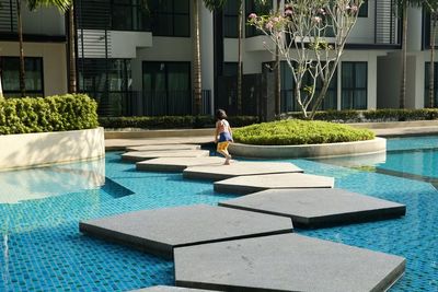 Full length of girl in swimming pool