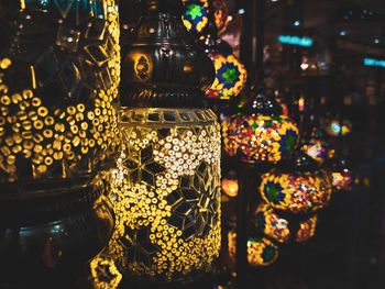 Close-up of illuminated lanterns