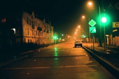 Cars on road at night