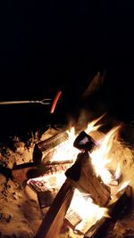 View of bonfire at night