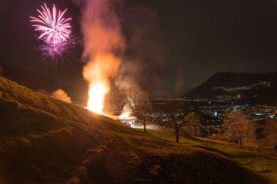 Firework display at night