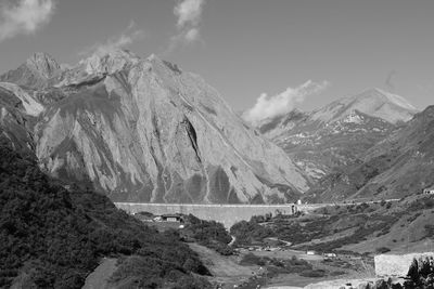 Panoramic view of snowcapped mountains against sky