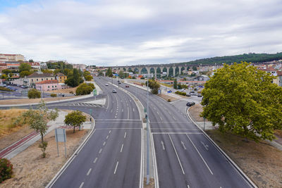 High angle view of city street against sky