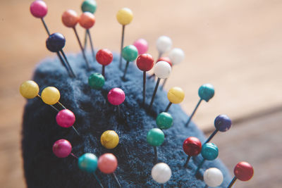 Close-up of multi colored pin needles