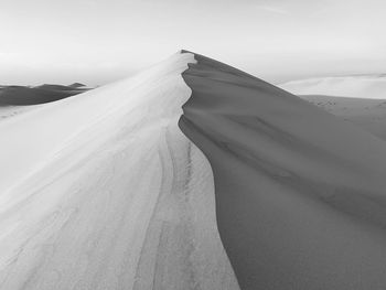 Scenic view of desert against sky