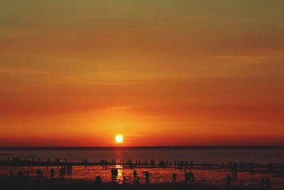 Scenic view of sea at sunset