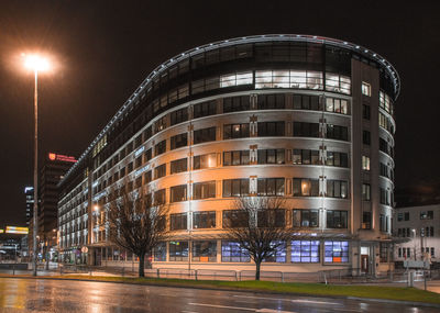 Illuminated buildings in city at night