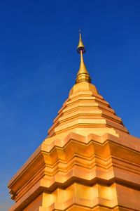 Low angle view of building against blue sky