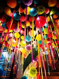 Low angle view of colorful lanterns hanging in market