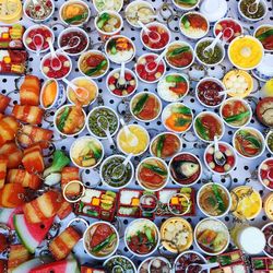 High angle view of multi colored candies on table