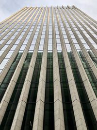 Low angle view of modern building against sky in city