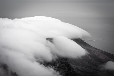 Scenic view of volcanic mountain against sky