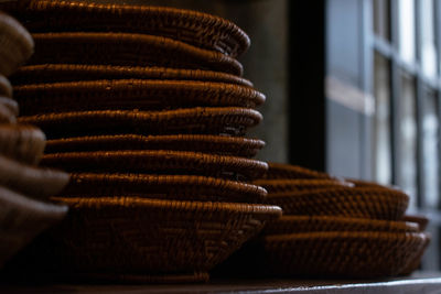 Close-up of wicker baskets on table