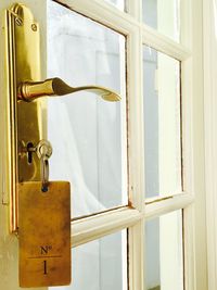 Close-up of clothes hanging on door