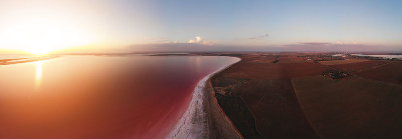 Panoramic view of sea against sky during sunset