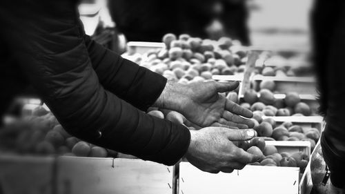 Midsection of man hand