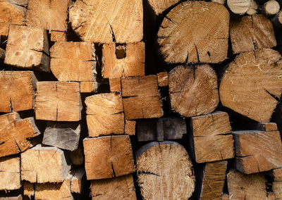 Full frame shot of logs in forest