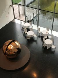 High angle view of illuminated restaurant on table