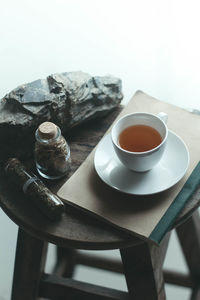 Close-up of coffee cup on table