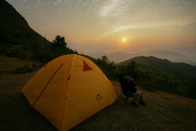 Scenic view of mountains against sky during sunset