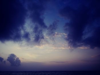 Scenic view of sea against dramatic sky