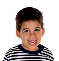 Portrait of smiling boy against white background