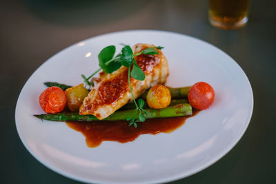 High angle view of chicken salad in plate on table