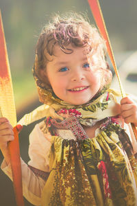 Portrait of smiling girl holding ice cream