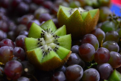 Full frame shot of kiwi and grapes