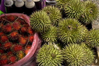 High angle view of rambutans for sale in market