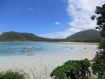 Scenic view of bay against sky