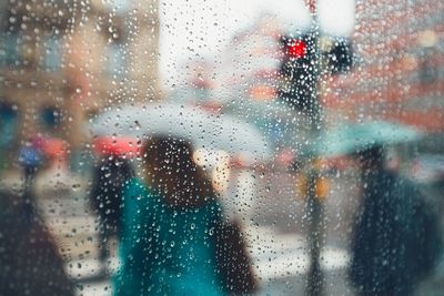 Full frame shot of wet window in rainy season