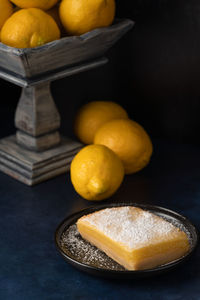 Close-up of fruits in plate on table