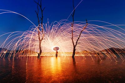 Firework display at night