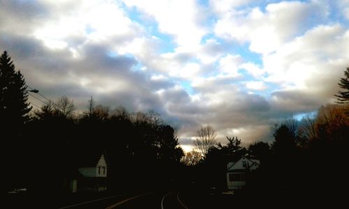 Silhouette trees against sky