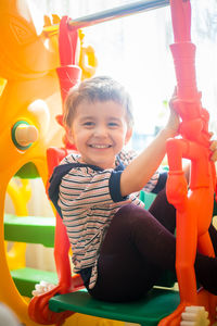 Portrait of smiling boy playing