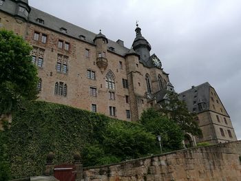 Low angle view of historical building against sky