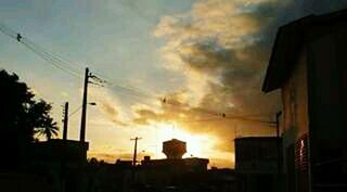 Built structure against sky at sunset