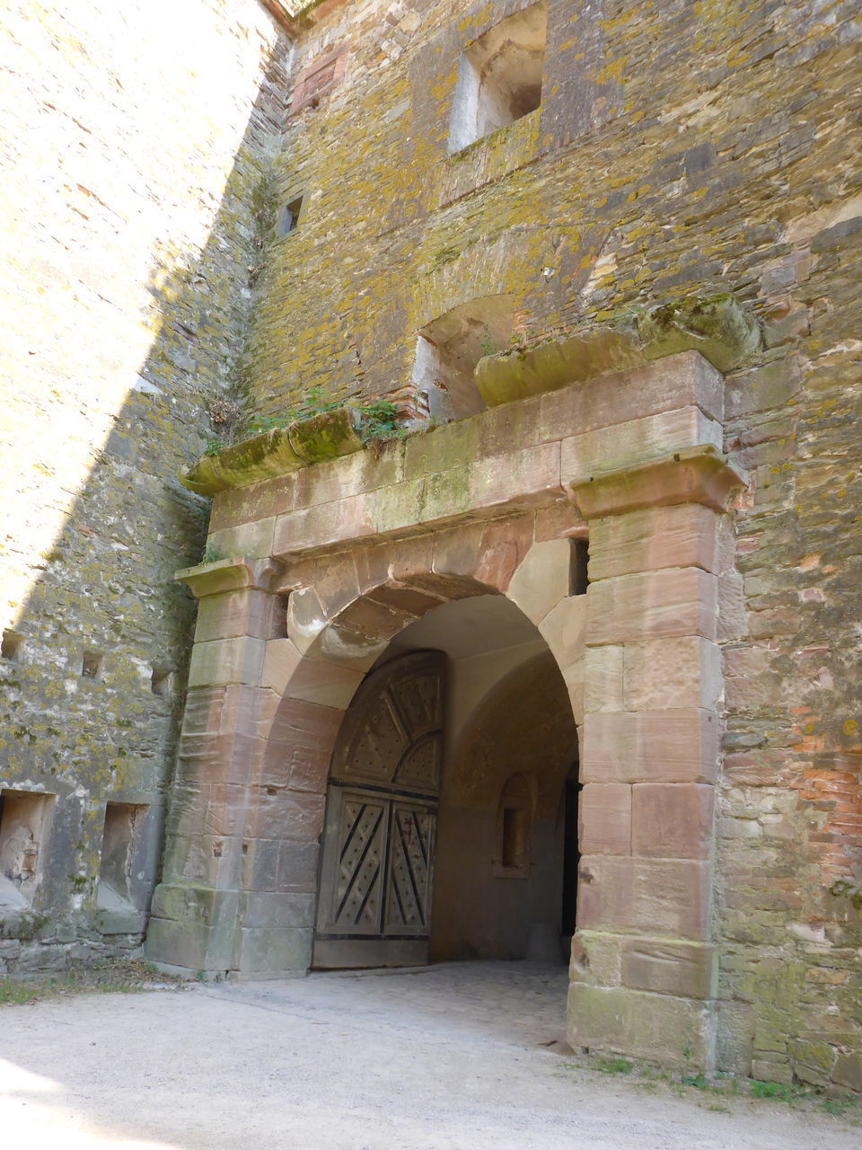 VIEW OF OLD BUILDING WITH WALL