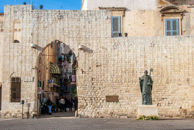 Statue of old building in city