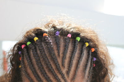 High section of girl with braided hair