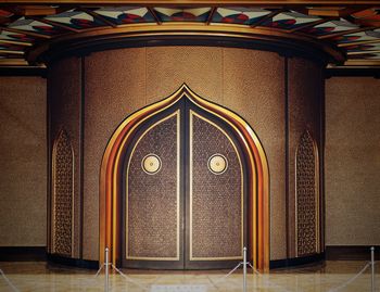 Close-up of ornate door in building