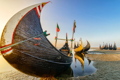 View of boats moored in water