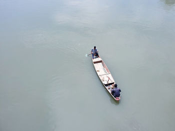 High angle view of people on boat in river