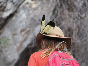 Rear view of woman wearing hat