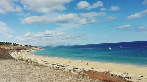 Scenic view of beach against sky