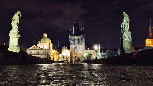 Illuminated charles bridge at night