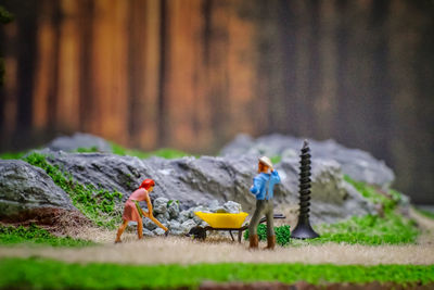 Children playing with toy on field